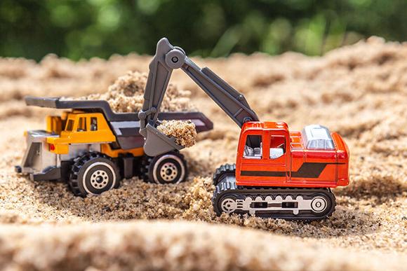 tow diggers in sandpit